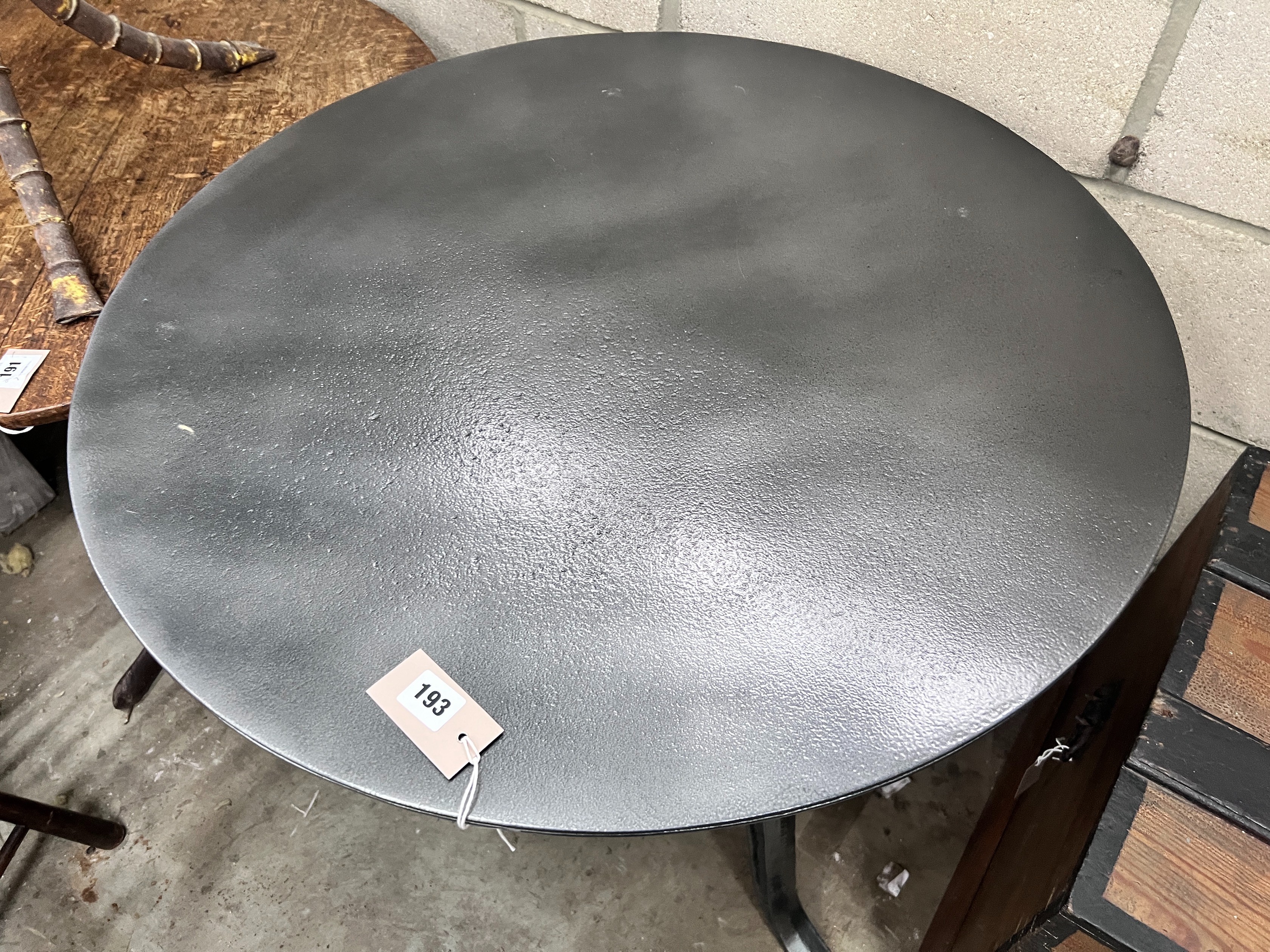 A cast iron and painted metal adjustable circular occasional table, width 75cm *Please note the sale commences at 9am.
